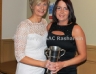 Pauline Quigg presents the Ciara McLaughlin Memorial Cup for Camogier of the year to Shauna Marie McMullan.